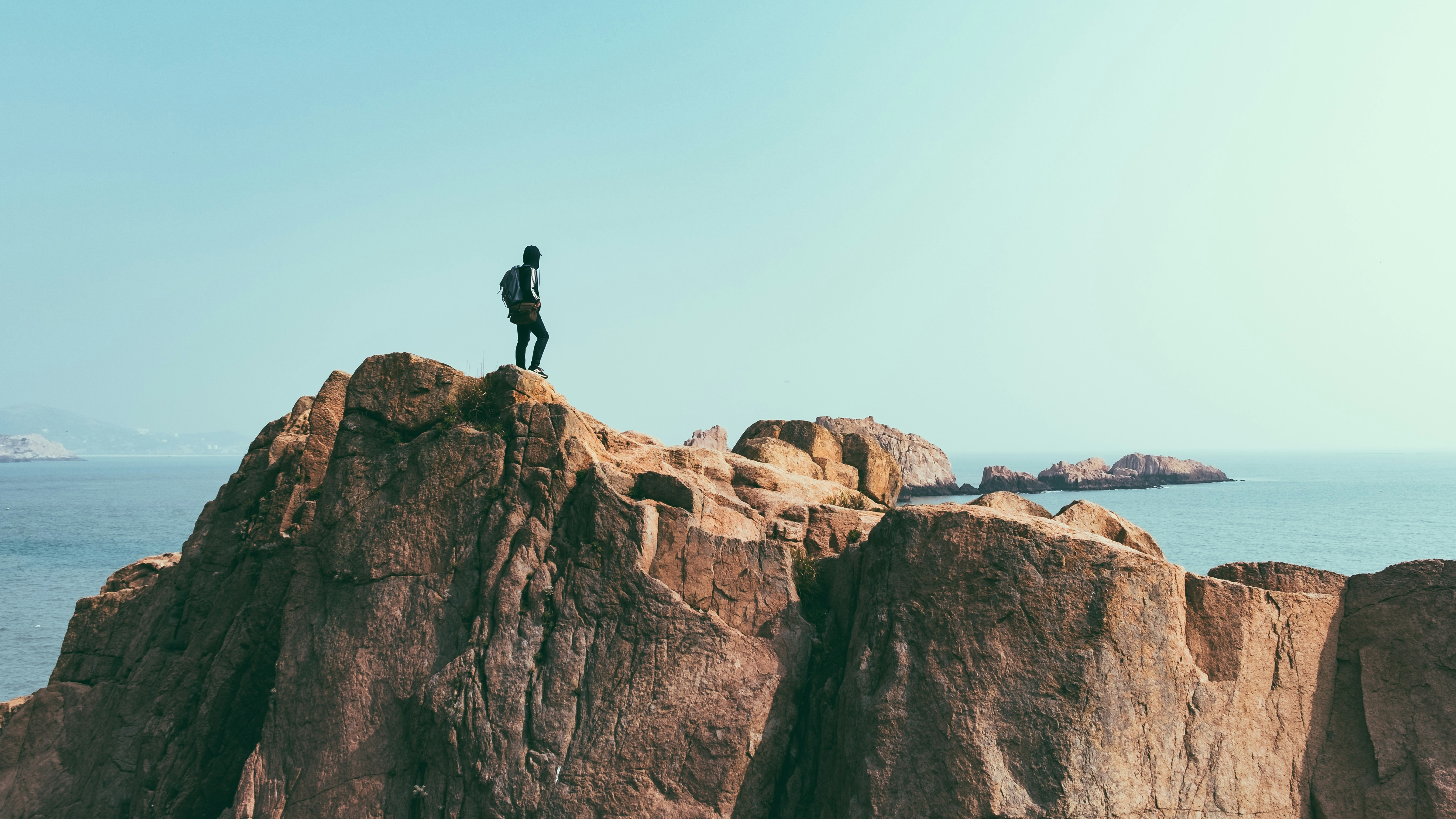 A hiker watching the sunrise